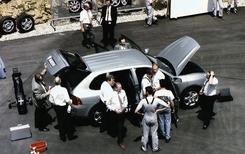 porsche board members inspect a first generation cayenne prototype in june 2000 100844558 h