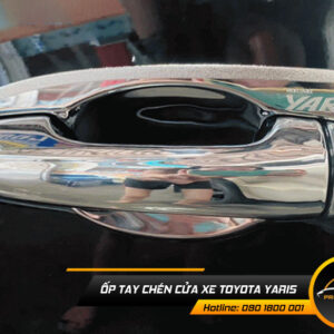 op tay chen cua xe toyota yaris 1