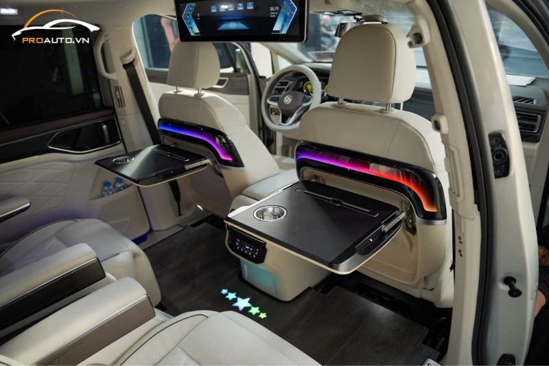 Bàn làm việc chỉnh cơ có led - Độ limousine xe Kia Carnival 2025