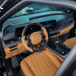 Bọc da và ốp gỗ tay lái xe Kia Carnival 2025